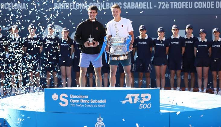 April 20, 2025, Sabadell, Barcelona, Spain: Barcelona Spain 20.04.2025 Carlos Alcaraz (Spain) and Holger Rune (Denmark) pose with the titles in the match between Carlos Alcaraz (Spain) and Holger Rune (Denmark) during the Day 7 of the Barcelona Open Banc Sabadell Godo on 20 April 2025 in Barcelona. Sabadell Spain - ZUMAu50_ 20250420_zsp_u50_139 Copyright: xXavixUrgelesx