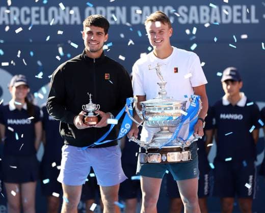April 20, 2025, Sabadell, Barcelona, Spain: Barcelona Spain 20.04.2025 Carlos Alcaraz (Spain) and Holger Rune (Denmark) pose with the titles in the match between Carlos Alcaraz (Spain) and Holger Rune (Denmark) during the Day 7 of the Barcelona Open Banc Sabadell Godo on 20 April 2025 in Barcelona. Sabadell Spain - ZUMAu50_ 20250420_zsp_u50_148 Copyright: xXavixUrgelesx
