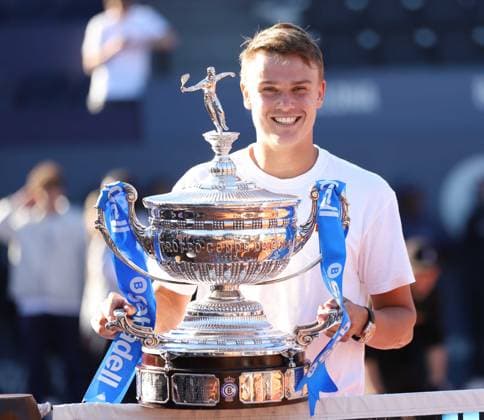 April 20, 2025, Sabadell, Barcelona, Spain: Barcelona Spain 20.04.2025 Holger Rune (Denmark) lifts the Barcelona Open title in the match between Carlos Alcaraz (Spain) and Holger Rune (Denmark) during the Day 7 of the Barcelona Open Banc Sabadell Godo on 20 April 2025 in Barcelona. Sabadell Spain - ZUMAu50_ 20250420_zsp_u50_159 Copyright: xXavixUrgelesx