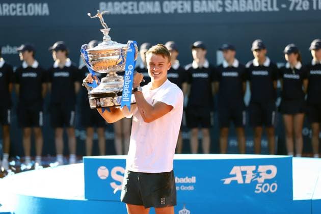 April 20, 2025, Sabadell, Barcelona, Spain: Barcelona Spain 20.04.2025 Holger Rune (Denmark) lifts the Barcelona Open title in the match between Carlos Alcaraz (Spain) and Holger Rune (Denmark) during the Day 7 of the Barcelona Open Banc Sabadell Godo on 20 April 2025 in Barcelona. Sabadell Spain - ZUMAu50_ 20250420_zsp_u50_163 Copyright: xXavixUrgelesx