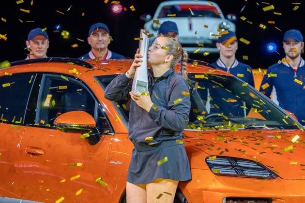 Jelena Ostapenko kisses the trophy she won in front of her new Porsche Macan, Aryna Sabalenka vs Jelena Ostapenko, Tennis, Porsche Tennis Grand Prix, Center Court, Womens Singles, Final, Season 2025, 21 04 2025, Aryna Sabalenka vs Jelena Ostapenko, Tennis, Porsche Tennis Grand Prix, Center Court, Womens Singles, Final, Season 2025, 21 04 2025, Stuttgart Copyright: xEibner-Pressefoto EdwardxCheungx EP_ECG