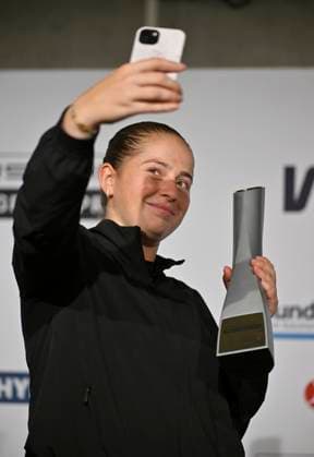 Jelena Ostapenko LAT Portrait makes selfie video for followers on Instagram with the smartphone and the trophy Press conference PK Tennis Ladies Porsche Cup Porsche Tennis Grand Prix GP Stuttgart 2025 Porsche Arena 21 04 2024 DFL REGULATIONS PROHIBIT ANY USE OF PHOTOGRAPHS AS IMAGE SEQUENCES AND OR QUASI VIDEO Tennis Ladies Porsche Cup Porsche Tennis Grand Prix GP Stuttgart 2025