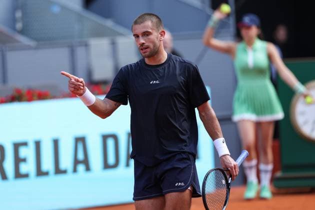 April 21, 2025, Madrid, Madrid, SPAIN: Borna Coric of Croatia gestures against Otto Virtanen of Finland during the Mutua Madrid Open 2025, ATP, Tennis Herren Masters 1000 and WTA, Tennis Damen 1000, tennis tournament celebrated at Caja Magica on April 21, 2025 in Madrid, Spain. Madrid SPAIN - ZUMAa181 20250421_zaa_a181_128 Copyright: xIrinaxR.xHipolitox