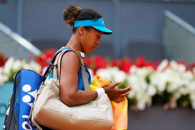 Mutua Madrid Open - Previews Naomi Osaka retires crestfallen after losing the match during the match between Japan s Naomi Osaka and Italy s Lucia Bronzetti of the Mutua Madrid Open 2025, ATP, Tennis Herren Masters 1000 and WTA, Tennis Damen 1000, tournament celebrated at Caja Magica on April 22, 2025 in Madrid, Spain. Madrid Spain  Copyright: xJosexBretonx originalFilename:bretonhernandez-mutuamad250422_npxJn.jpg
