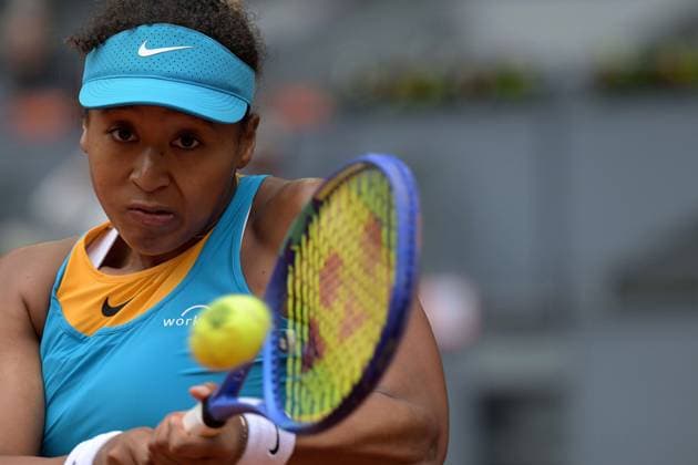 April 22, 2025, Madrid, Spain: NAOMI OSAKA of Japan in action against L. Bronzetti of Italy during the Mutua Madrid Open 2025 on Day Two at La Caja Magica. Madrid Spain - ZUMAd308 20250422_zsp_d308_009 Copyright: xJuanxCarlosxLucasx