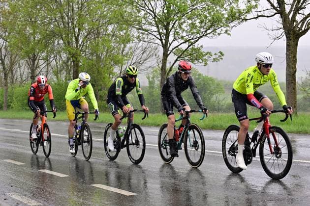 Belgian Tom Paquot of Intermarche-Wanty, Belgian Siebe Deweirdt of Team Flanders Baloise, Belgian Criel Desal of Wagner Bazin WB, French Simon Guglielmi of Arkea-BB Hotels and American Artem Shmidt of Ineos Grenadiers pictured in action during the men s race of the La Fleche Wallonne , one day cycling race (Waalse Pijl - Walloon Arrow), 205,2 km from Ciney to Huy, Wednesday 23 April 2025. DIRKxWAEM  x121629464x