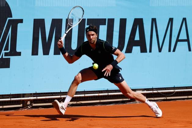 April 23, 2025, Madrid, Madrid, SPAIN: Arthur Rinderknech of France in action against Roman Safiullin of Russia during the Mutua Madrid Open 2025, ATP, Tennis Herren Masters 1000 and WTA, Tennis Damen 1000, tennis tournament celebrated at Caja Magica on April 23, 2025 in Madrid, Spain. Madrid SPAIN - ZUMAa181 20250423_zaa_a181_088 Copyright: xDennisxAgyemanx