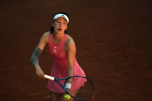 April 23, 2025, Madrid, Madrid, Spain: XINYU WANG of China during her match against MARIA SAKKARI of Greece on Day Three of the Mutua Madrid Open at La Caja Magica. Madrid Spain - ZUMAd308 20250423_zsp_d308_020 Copyright: xJuanxCarlosxLucasx