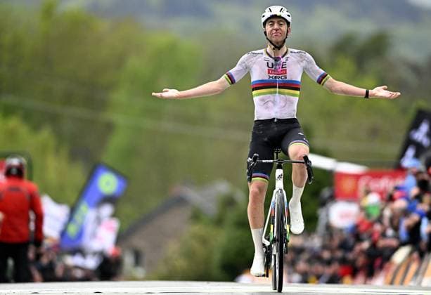 Slovenian Tadej Pogacar of UAE Team Emirates celebrates after winning the men s race of the La Fleche Wallonne , one day cycling race (Waalse Pijl - Walloon Arrow), 205,2 km from Ciney to Huy, Wednesday 23 April 2025. JASPERxJACOBS  x121651407x