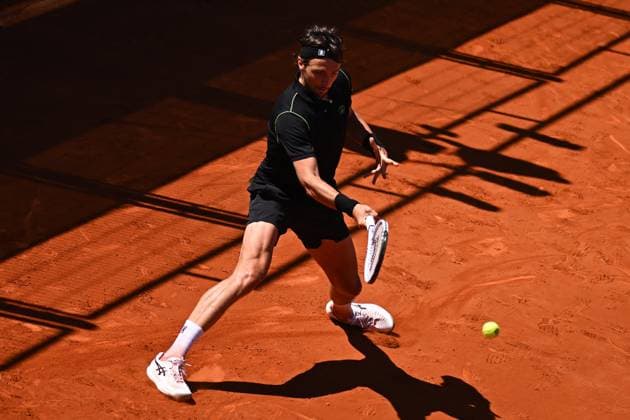 Mutua Madrid Open - First Round Arthur Rinderknech (FRA) during his first round match at the Mutua Madrid Open in Madrid , Spain, on April, 23, 2025. Photo by Corinne Dubreuil ABACAPRESS.COM Madrid Spain  Copyright: xDubreuilxCorinne ABACAx