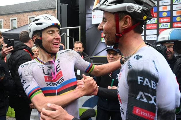 La Fleche Wallonne 2025 cycling race HUY, BELGIUM - APRIL 22 : Pogacar Tadej (SLO) of UAE Team Emirates - XRG celebrating his victory with a teammate during the Men Elite UCI 1.Pro 89th A.S.O. La Fleche Wallonne cycling race with start in Ciney and finish in Huy (205,2 km) on April 22, 2025 in Huy, Belgium, 22 04 2025 Huy Belgium  Copyright: xVincentxKalutx