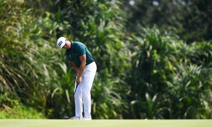 (250424) -- HAIKOU, April 24, 2025 -- Johannes Veerman of the United States hits his putt during the round 1 at the Hainan Classic golf tournament of the DP World Tour in Haikou, south China s Hainan Province, April 24, 2025. ) (SP)CHINA-HAIKOU-GOLF-DP WORLD TOUR-HAINAN CLASSIC-ROUND 1 (CN) YangxGuanyu 