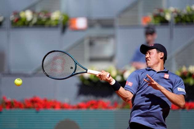 April 24, 2025, Madrid, Madrid, Spain: Kei Nishikori of Japan in action against Aleksandar Vukic of Australia during the Mutua Madrid Open 2025, ATP, Tennis Herren Masters 1000 and WTA, Tennis Damen 1000 tennis tournament, celebrated at Caja Magica on April 24, 2025 in Madrid, Spain. Madrid Spain - ZUMAOpen 20250424_zaa_a181_006 Copyright: xOscarxJ.xBarrosox