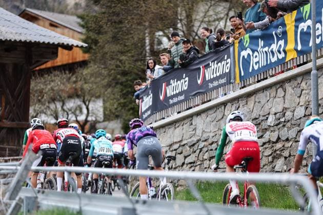 CYCLING - Tour of the Alps 2025 LIENZ,AUSTRIA,25.APR.25 - CYCLING - Tour of the Alps, stage 5, Lienz - Lienz. Image shows the peloton with fans.  GEPAxpictures xDavidxGeieregger