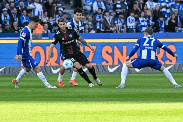 Soccer 2 Bundesliga, Hertha BSC Berlin 1 FC Magdeburg 25 04 2025, xdanx, Soccer 2 Bundesliga, Hertha BSC Berlin 1 FC Magdeburg v l Diego Demme Hertha BSC ,Marcus Mathisen 1 FC Magdeburg Ibrahim Maza Hertha BSC ,Michael Cuisance Hertha BSC ,duel, duel, fight, tackle DFL DFB REGULATIONS PROHIBIT ANY USE OF PHOTOGRAPHS as IMAGE SEQUENCES and or QUASI VIDEO Daniel Lakomski Mix1Press Berlin Olympiastadion Berlin Germany DEU Copyright: xDanielxLakomskix