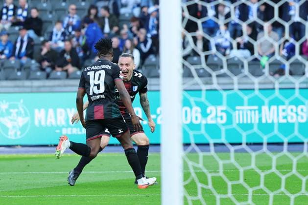 2 Soccer Bundesliga, Hertha BSC 1 FC Magdeburg Goal celebration, cheering Lubambo Musonda Magdeburg 19 celebrates the goal to 0 1 with Bar Atik Magdeburg 23 during the match in the 2 Soccer Bundesliga, Hertha BSC 1 FC Magdeburg in Berlin, Olympiastadion, on 25 04 2025 DFB regulations prohibit any use of photographs as image sequences and or quasi video Copyright: xBEAUTIFULxSPORTS Frankex