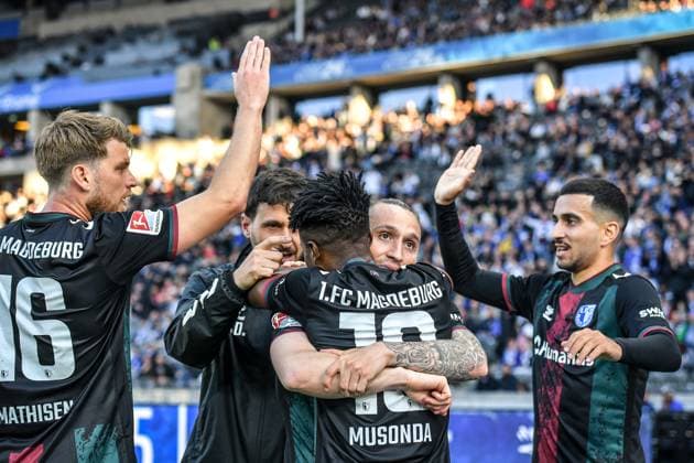 Soccer 2 Bundesliga, Hertha BSC Berlin 1 FC Magdeburg 25 04 2025, xdanx, Soccer 2 Bundesliga, Hertha BSC Berlin 1 FC Magdeburg v l Marcus Mathisen 1 FC Magdeburg ,Lubambo Musonda 1 FC Magdeburg ,BarÄ±Åü Atik 1 FC Magdeburg , Livan Burcu 1 FC Magdeburg cheering after the 0 1 DFL DFB REGULATIONS PROHIBIT ANY USE OF PHOTOGRAPHS as IMAGE SEQUENCES and or QUASI VIDEO Daniel Lakomski Mix1Press Berlin Olympiastadion Berlin Germany DEU Copyright: xDanielxLakomskix