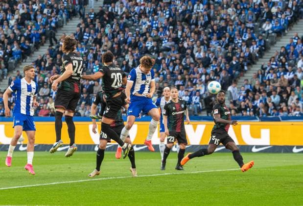 Soccer, Men, Season 2024 2025, 2 Bundesliga 31 Matchday , Hertha BSC 1 FC Magdeburg, Linus Gechter Hertha BSC scores the goal to 1 1 against Jean Hugonet 1 FC Magdeburg , Xavier Amaechi 1 FC Magdeburg , Marcus Mathisen 1 FC Magdeburg , Baris Atik 1 FC Magdeburg and Daniel Heber 1 FC Magdeburg , 25 04 2025, Copyright: xSebastianxRäppold MatthiasxKochx