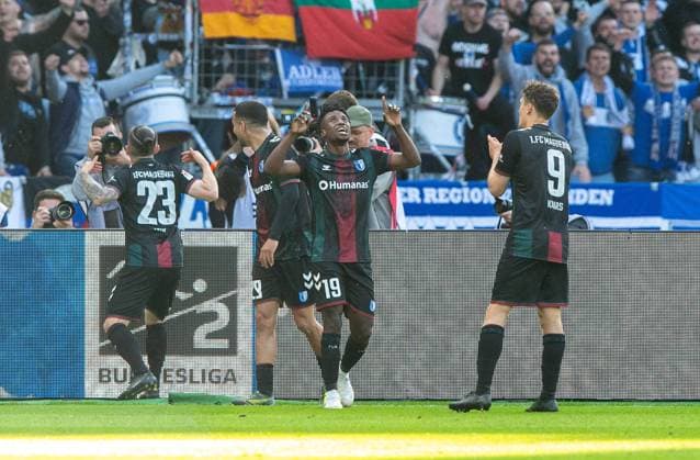 Soccer, Men, Season 2024 2025, 2 Bundesliga 31 Matchday , Hertha BSC 1 FC Magdeburg, f l Baris Atik 1 FC Magdeburg , Livan Burcu 1 FC Magdeburg , Lubambo Musonda 1 FC Magdeburg , Martijn Kaars 1 FC Magdeburg , Cheering after goal to 0 1, 25 04 2025, Copyright: xSebastianxRäppold MatthiasxKochx