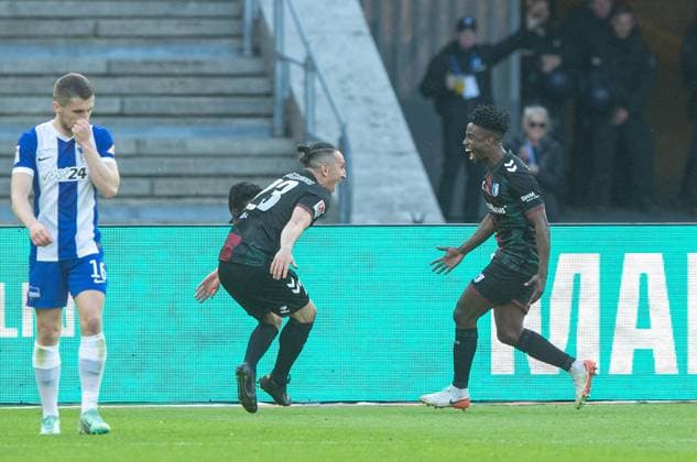 Soccer, Men, Season 2024 2025, 2 Bundesliga 31 Matchday , Hertha BSC 1 FC Magdeburg, f l Jonjoe Kenny Hertha BSC , Baris Atik 1 FC Magdeburg , Lubambo Musonda 1 FC Magdeburg , Cheering after goal to 0 1, 25 04 2025, Copyright: xSebastianxRäppold MatthiasxKochx