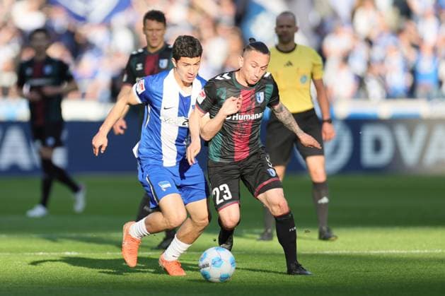2 Soccer Bundesliga, Hertha BSC 1 FC Magdeburg Bar Atik Magdeburg 23 in a duel with Ibrahim Maza Hertha BSC Berlin 10 , during the match in the 2 Soccer Bundesliga, Hertha BSC 1 FC Magdeburg in Berlin, Olympiastadion, on 25 04 2025 DFB regulations prohibit any use of photographs as image sequences and or quasi video Copyright: xBEAUTIFULxSPORTS Frankex
