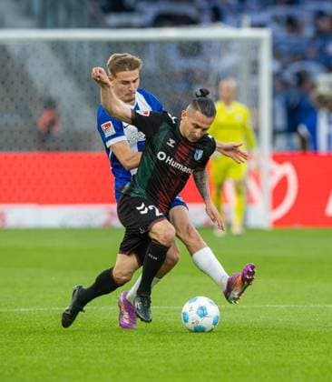 Soccer, Men, Season 2024 2025, 2 Bundesliga 31 Matchday , Hertha BSC 1 FC Magdeburg, v l Marten Winkler Hertha BSC , Baris Atik 1 FC Magdeburg , 25 04 2025, Copyright: xSebastianxRäppold MatthiasxKochx