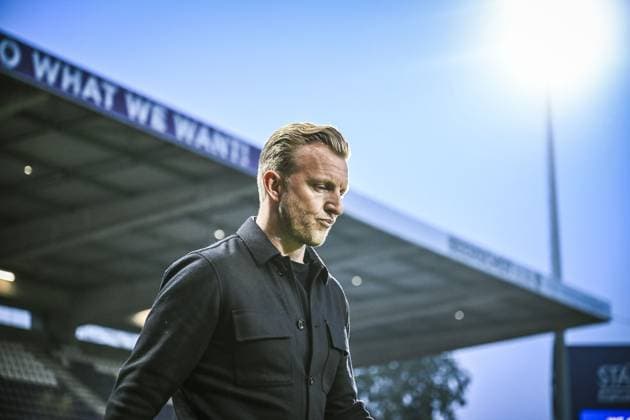 Beerschot s head coach Dirk Kuyt pictured at the start of a soccer match between Beerschot VA and KV Kortrijk, Friday 25 April 2025 in Kortrijk, on day 4 (out of 6) of the Relegation Play-offs of the 2024-2025 Jupiler Pro League first division of the Belgian championship. TOM GOYVAERTS TomxGoyvaerts  x121844357x