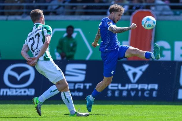 Soccer 2 Bundesliga 31 Matchday SC Preußen Münster SV Darmstadt 98 on 26 04 2025 at LVM Preußenstadion in Münster Jano Ter Horst Münster , left Luca Marseiler Darmstadt , right DFL regulations prohibit any use of photographs as image sequences and or quasi video xJRx