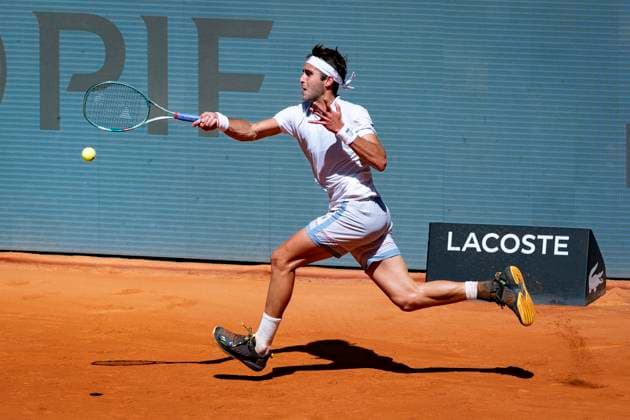 Mutua Madrid Open 2025 Tomas Etcheverry of Argentina plays a forehand against Lorenzo Musetti of Italy during Men s Round of 64 match of the Mutua Madrid Open 2025 tournament celebrated at La Caja Magica on April 26, 2025 in Madrid, Spain. Madrid La Caja Magica Madrid Spain Copyright: xAlbertoxGardinx AGardin_20250426_Mutua_Madrid_Open_0302