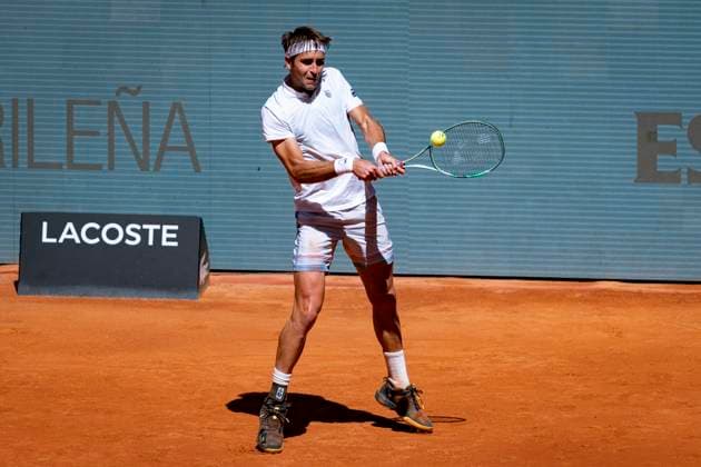 Mutua Madrid Open 2025 Tomas Etcheverry of Argentina plays a backhand against Lorenzo Musetti of Italy during Men s Round of 64 match of the Mutua Madrid Open 2025 tournament celebrated at La Caja Magica on April 26, 2025 in Madrid, Spain. Madrid La Caja Magica Madrid Spain Copyright: xAlbertoxGardinx AGardin_20250426_Mutua_Madrid_Open_0304