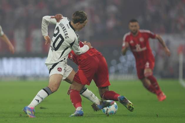 Caspar Jander 1 FC Nürnberg and Mayron van Brederode Fortuna Duesseldorf battle for the ball during the 2 Bundesliga match between Fortuna Düsseldorf and 1 FC Nürnberg at Merkur Spiel Arena on April 26, 2025 in Düsseldorf, Germany, Germany Photo by Oliver Kaelke DeFodi Images Caspar Jander 1 FC Nürnberg and Mayron van Brederode Fortuna Duesseldorf battle for the ball during the 2 Bundesliga match between Fortuna Düsseldorf and 1 FC Nürnberg at Merkur Spiel Arena on April 26, 2025 in Düsseldorf, Germany Photo by Oliver Kaelke DeFodi Images DFB DFL REGULATIONS PROHIBIT ANY USE OF PHOTOGRAPHS AS IMAGE SEQUENCES AND OR QUASI VIDEO Photo by Oliver Kaelke DeFodi Images
