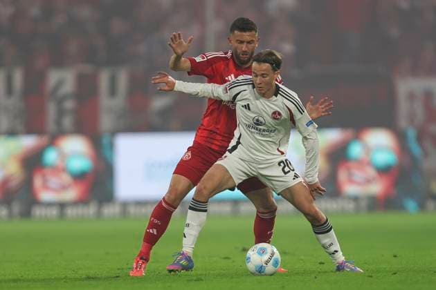 Caspar Jander 1 FC Nürnberg and Nicolas Gavory Fortuna Duesseldorf battle for the ball during the 2 Bundesliga match between Fortuna Düsseldorf and 1 FC Nürnberg at Merkur Spiel Arena on April 26, 2025 in Düsseldorf, Germany, Germany Photo by Oliver Kaelke DeFodi Images Caspar Jander 1 FC Nürnberg and Nicolas Gavory Fortuna Duesseldorf battle for the ball during the 2 Bundesliga match between Fortuna Düsseldorf and 1 FC Nürnberg at Merkur Spiel Arena on April 26, 2025 in Düsseldorf, Germany Photo by Oliver Kaelke DeFodi Images DFB DFL REGULATIONS PROHIBIT ANY USE OF PHOTOGRAPHS AS IMAGE SEQUENCES AND OR QUASI VIDEO Photo by Oliver Kaelke DeFodi Images