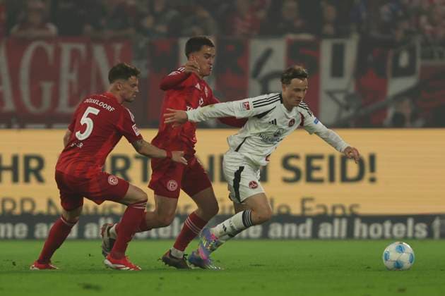 Moritz Heyer Fortuna Duesseldorf , Giovanni Haag Fortuna Duesseldorf and Caspar Jander 1 FC Nürnberg battle for the ball during the 2 Bundesliga match between Fortuna Düsseldorf and 1 FC Nürnberg at Merkur Spiel Arena on April 26, 2025 in Düsseldorf, Germany Photo by Oliver Kaelke DeFodi Images Moritz Heyer Fortuna Duesseldorf , Giovanni Haag Fortuna Duesseldorf and Caspar Jander 1 FC Nürnberg battle for the ball during the 2 Bundesliga match between Fortuna Düsseldorf and 1 FC Nürnberg at Merkur Spiel Arena on April 26, 2025 in Düsseldorf, Germany Photo by Oliver Kaelke DeFodi Images DFB DFL REGULATIONS PROHIBIT ANY USE OF PHOTOGRAPHS AS IMAGE SEQUENCES AND OR QUASI VIDEO Photo by Oliver Kaelke DeFodi Images