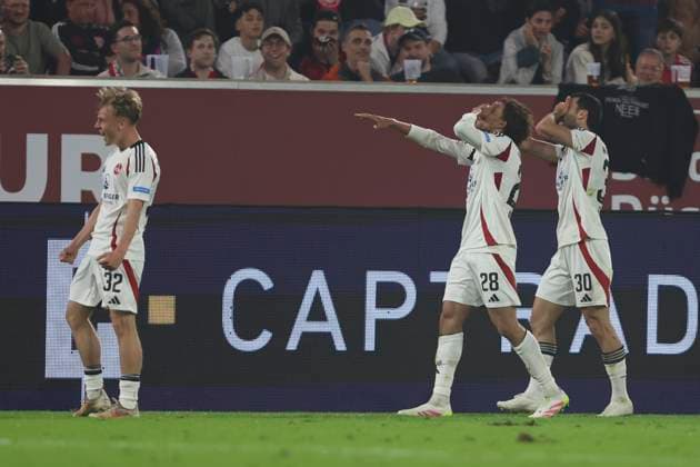Mahir Emreli 1 FC Nürnberg celebrates after scoring his team s second goal with teammates during the 2 Bundesliga match between Fortuna Düsseldorf and 1 FC Nürnberg at Merkur Spiel Arena on April 26, 2025 in Düsseldorf, Germany, Germany Photo by Oliver Kaelke DeFodi Images Mahir Emreli 1 FC Nürnberg celebrates after scoring his team s second goal with teammates during the 2 Bundesliga match between Fortuna Düsseldorf and 1 FC Nürnberg at Merkur Spiel Arena on April 26, 2025 in Düsseldorf, Germany Photo by Oliver Kaelke DeFodi Images DFB DFL REGULATIONS PROHIBIT ANY USE OF PHOTOGRAPHS AS IMAGE SEQUENCES AND OR QUASI VIDEO Photo by Oliver Kaelke DeFodi Images