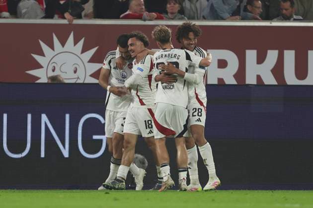 Mahir Emreli 1 FC Nürnberg celebrates after scoring his team s second goal with teammates during the 2 Bundesliga match between Fortuna Düsseldorf and 1 FC Nürnberg at Merkur Spiel Arena on April 26, 2025 in Düsseldorf, Germany, Germany Photo by Oliver Kaelke DeFodi Images Mahir Emreli 1 FC Nürnberg celebrates after scoring his team s second goal with teammates during the 2 Bundesliga match between Fortuna Düsseldorf and 1 FC Nürnberg at Merkur Spiel Arena on April 26, 2025 in Düsseldorf, Germany Photo by Oliver Kaelke DeFodi Images DFB DFL REGULATIONS PROHIBIT ANY USE OF PHOTOGRAPHS AS IMAGE SEQUENCES AND OR QUASI VIDEO Photo by Oliver Kaelke DeFodi Images