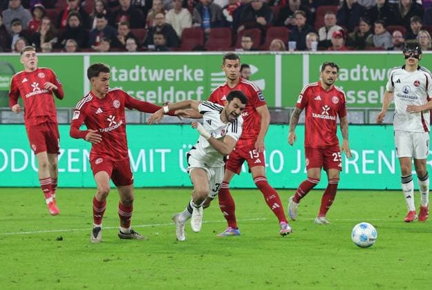 26 04 2024 Soccer Season 2024 2025 2 Soccer Bundesliga 31 Matchday Fortuna Düsseldorf 95 F95 1 FC Nuremberg FCN Club Sportfoto Zink DaMa xdaxmax DFL regulations prohibit any use of photographs as image sequences and or quasi video only for editorial use Giovanni Haag 6, Fortuna Düsseldorf F95 holds Mahir Emreli 30, 1 FC Nuremberg FCN in penalty area