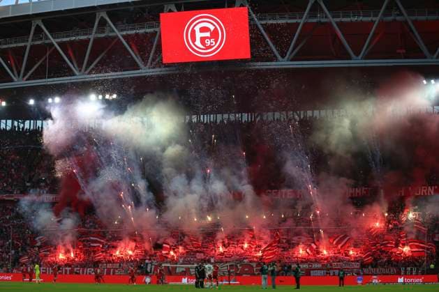 Fans of Fortuna Duesseldorf using pyrotechnics during the 2 Bundesliga match between Fortuna Düsseldorf and 1 FC Nürnberg at Merkur Spiel Arena on April 26, 2025 in Düsseldorf, Germany Photo by Oliver Kaelke DeFodi Images Supporters of Fortuna Duesseldorf use pyrotechnics during the 2 Bundesliga match between Fortuna Düsseldorf and 1 FC Nürnberg at Merkur Spiel Arena on April 26, 2025 in Düsseldorf, Germany Photo by Oliver Kaelke DeFodi Images DFB DFL REGULATIONS PROHIBIT ANY USE OF PHOTOGRAPHS AS IMAGE SEQUENCES AND OR QUASI VIDEO Photo by Oliver Kaelke DeFodi Images