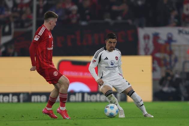 Isak Bergmann Johannesson Fortuna Duesseldorf and Danilo Soares 1 FC Nuremberg battle for the ball during the 2 Bundesliga match between Fortuna Duesseldorf and 1 FC Nuremberg at Merkur Spiel Arena on April 26, 2025 in Duesseldorf, Germany, Germany Photo by Oliver Kaelke DeFodi Images Isak Bergmann Johannesson Fortuna Duesseldorf and Danilo Soares 1 FC Nürnberg battle for the ball during the 2 Bundesliga match between Fortuna Düsseldorf and 1 FC Nürnberg at Merkur Spiel Arena on April 26, 2025 in Düsseldorf, Germany Photo by Oliver Kaelke DeFodi Images DFB DFL REGULATIONS PROHIBIT ANY USE OF PHOTOGRAPHS AS IMAGE SEQUENCES AND OR QUASI VIDEO Photo by Oliver Kaelke DeFodi Images
