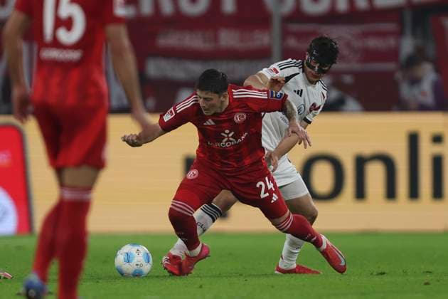 Dawid Kownacki Fortuna Duesseldorf and Fabio Gruber 1 FC Nuremberg battle for the ball during the 2 Bundesliga match between Fortuna Duesseldorf and 1 FC Nuremberg at Merkur Spiel Arena on April 26, 2025 in Duesseldorf, Germany, Germany Photo by Oliver Kaelke DeFodi Images Dawid Kownacki Fortuna Duesseldorf and Fabio Gruber 1 FC Nürnberg battle for the ball during the 2 Bundesliga match between Fortuna Düsseldorf and 1 FC Nürnberg at Merkur Spiel Arena on April 26, 2025 in Düsseldorf, Germany Photo by Oliver Kaelke DeFodi Images DFB DFL REGULATIONS PROHIBIT ANY USE OF PHOTOGRAPHS AS IMAGE SEQUENCES AND OR QUASI VIDEO Photo by Oliver Kaelke DeFodi Images