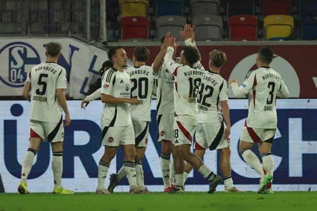 Julian Justvan 1 FC Nürnberg celebrates after scoring his team s third goal with teammates during the 2 Bundesliga match between Fortuna Düsseldorf and 1 FC Nürnberg at Merkur Spiel Arena on April 26, 2025 in Düsseldorf, Germany, Germany Photo by Oliver Kaelke DeFodi Images Julian Justvan 1 FC Nürnberg celebrates after scoring his team s third goal with teammates during the 2 Bundesliga match between Fortuna Düsseldorf and 1 FC Nürnberg at Merkur Spiel Arena on April 26, 2025 in Düsseldorf, Germany Photo by Oliver Kaelke DeFodi Images DFB DFL REGULATIONS PROHIBIT ANY USE OF PHOTOGRAPHS AS IMAGE SEQUENCES AND OR QUASI VIDEO Photo by Oliver Kaelke DeFodi Images