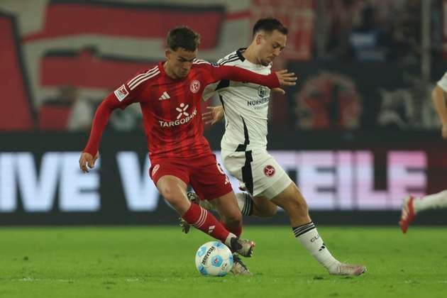 Giovanni Haag Fortuna Duesseldorf and Julian Justvan 1 FC Nürnberg in a duel during the 2 Bundesliga match between Fortuna Duesseldorf and 1 FC Nürnberg at Merkur Spiel Arena on April 26, 2025 in Duesseldorf, Germany, Germany Photo by Oliver Kaelke DeFodi Images Giovanni Haag Fortuna Duesseldorf and Julian Justvan 1 FC Nürnberg battle for the ball during the 2 Bundesliga match between Fortuna Düsseldorf and 1 FC Nürnberg at Merkur Spiel Arena on April 26, 2025 in Düsseldorf, Germany Photo by Oliver Kaelke DeFodi Images DFB DFL REGULATIONS PROHIBIT ANY USE OF PHOTOGRAPHS AS IMAGE SEQUENCES AND OR QUASI VIDEO Photo by Oliver Kaelke DeFodi Images
