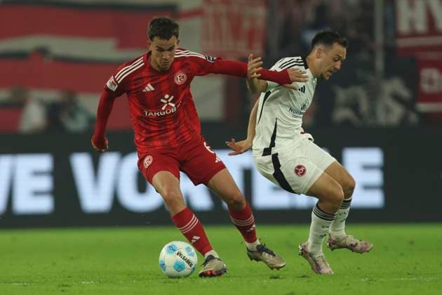 Giovanni Haag Fortuna Duesseldorf and Julian Justvan 1 FC Nürnberg in a duel during the 2 Bundesliga match between Fortuna Duesseldorf and 1 FC Nürnberg at Merkur Spiel Arena on April 26, 2025 in Duesseldorf, Germany, Germany Photo by Oliver Kaelke DeFodi Images Giovanni Haag Fortuna Duesseldorf and Julian Justvan 1 FC Nürnberg battle for the ball during the 2 Bundesliga match between Fortuna Düsseldorf and 1 FC Nürnberg at Merkur Spiel Arena on April 26, 2025 in Düsseldorf, Germany Photo by Oliver Kaelke DeFodi Images DFB DFL REGULATIONS PROHIBIT ANY USE OF PHOTOGRAPHS AS IMAGE SEQUENCES AND OR QUASI VIDEO Photo by Oliver Kaelke DeFodi Images