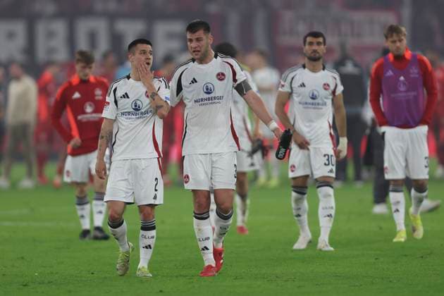 Oliver Villadsen 1 FC Nürnberg speaks with Robin Knoche 1 FC Nürnberg during the 2 Bundesliga match between Fortuna Düsseldorf and 1 FC Nürnberg at Merkur Spiel Arena on April 26, 2025 in Düsseldorf, Germany, Germany Photo by Oliver Kaelke DeFodi Images Oliver Villadsen 1 FC Nürnberg speaks with Robin Knoche 1 FC Nürnberg during the 2 Bundesliga match between Fortuna Düsseldorf and 1 FC Nürnberg at Merkur Spiel Arena on April 26, 2025 in Düsseldorf, Germany Photo by Oliver Kaelke DeFodi Images DFB DFL REGULATIONS PROHIBIT ANY USE OF PHOTOGRAPHS AS IMAGE SEQUENCES AND OR QUASI VIDEO Photo by Oliver Kaelke DeFodi Images