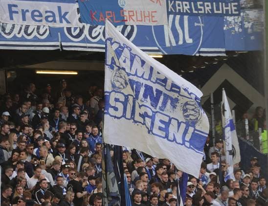 Flag of the fans of KSC Football, Men, Season 2024 2025, 2 BL, Volksparkstadion, Hamburger SV vs Karlsruher SC DFL REGULATIONS PROHIBIT ANY USE OF PHOTOGRAPHS AS IMAGE SEQUENCES AND OR QUASI VIDEO