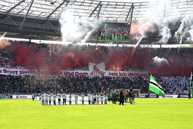 Fans 1 FC Koeln supporters use pyrotechnics during the 2 Bundesliga match between Hannover 96 and 1 FC Köln at Heinz von Heiden Arena on April 27, 2025 in Hanover, Germany Photo by Ralf Treese DeFodi Images Fans 1 FC Koeln supporters use pyrotechnics during the 2 Bundesliga match between Hannover 96 and 1 FC Köln at Heinz von Heiden Arena on April 27, 2025 in Hanover, Germany Photo by Ralf Treese DeFodi Images DFB DFL REGULATIONS PROHIBIT ANY USE OF PHOTOGRAPHS AS IMAGE SEQUENCES AND OR QUASI VIDEO Photo by Ralf Treese DeFodi Images