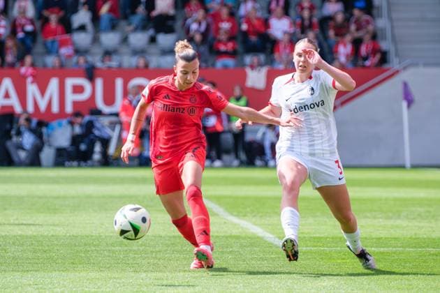 Arianna Caruso 27, FC Bayern Munich and Alina Axtmann 3, SC Freiburg at the match FC Bayern Munich v SC Freiburg, Football, Women, Google Pixel Women Bundesliga, 2024 2025, 20 Matchday on 27 04 2025 in Munich, FC Bayern Campus DFL and DFB regulations prohibit any use of photographs as image sequences and or quasi video Bayern Germany
