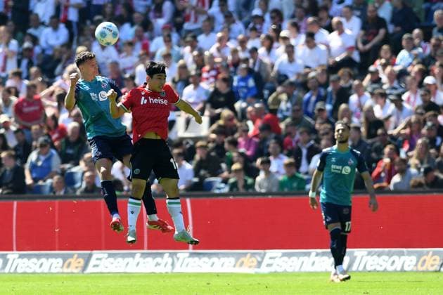 Eric Martel 1 FC Koeln and Hyun ju Lee Hannover 96 battle for the ball during the 2 Bundesliga match between Hannover 96 and 1 FC Köln at Heinz von Heiden Arena on April 27, 2025 in Hannover, Germany, Germany Photo by Ralf Treese DeFodi Images Eric Martel 1 FC Koeln and Hyun ju Lee Hannover 96 battle for the ball during the 2 Bundesliga match between Hannover 96 and 1 FC Köln at Heinz von Heiden Arena on April 27, 2025 in Hanover, Germany Photo by Ralf Treese DeFodi Images DFB DFL REGULATIONS PROHIBIT ANY USE OF PHOTOGRAPHS AS IMAGE SEQUENCES AND OR QUASI VIDEO Photo by Ralf Treese DeFodi Images