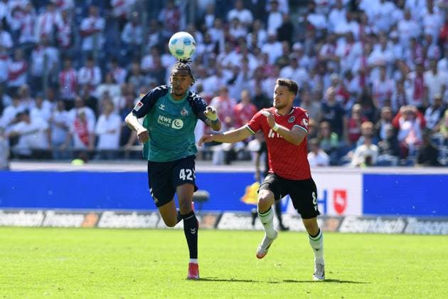 Damion Downs 1 FC Koeln and Enzo Leopold Hannover 96 battle for the ball during the 2 Bundesliga match between Hannover 96 and 1 FC Köln at Heinz von Heiden Arena on April 27, 2025 in Hannover, Germany Germany Photo by Ralf Treese DeFodi Images Damion Downs 1 FC Koeln and Enzo Leopold Hannover 96 battle for the ball during the 2 Bundesliga match between Hannover 96 and 1 FC Köln at Heinz von Heiden Arena on April 27, 2025 in Hanover, Germany Photo by Ralf Treese DeFodi Images DFB DFL REGULATIONS PROHIBIT ANY USE OF PHOTOGRAPHS AS IMAGE SEQUENCES AND OR QUASI VIDEO Photo by Ralf Treese DeFodi Images