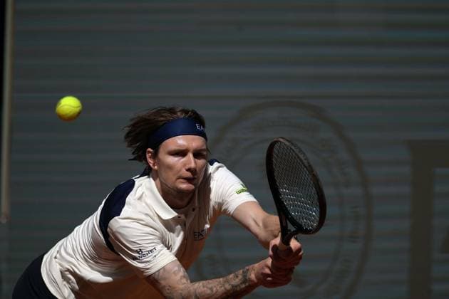 April 27, 2025, Madrid, Madrid, Spain: Kazakstan s ALEXANDER BUBLIK plays against Russia s ANDREY RUBLEV during their 2025 ATP, Tennis Herren Tour Madrid Open tennis tournament third round singles match at the Caja Magica. Alexander Bublik won 6-4,0-6, 6-4. Madrid Spain - ZUMAd308 20250427_zsp_d308_016 Copyright: xJuanxCarlosxLucasx