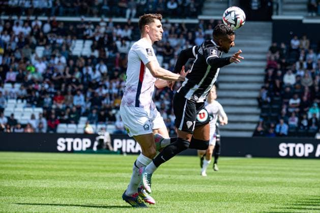 FOOTBALL : SCO Angers vs Lille OSC - Ligue 1 - JournÃ e 31 - 27 04 2025 Jim Allevinah (ANGERS SCO) Thomas Meunier (Lille OSC) AngersFrance  Copyright: xBaptistexAutissierx